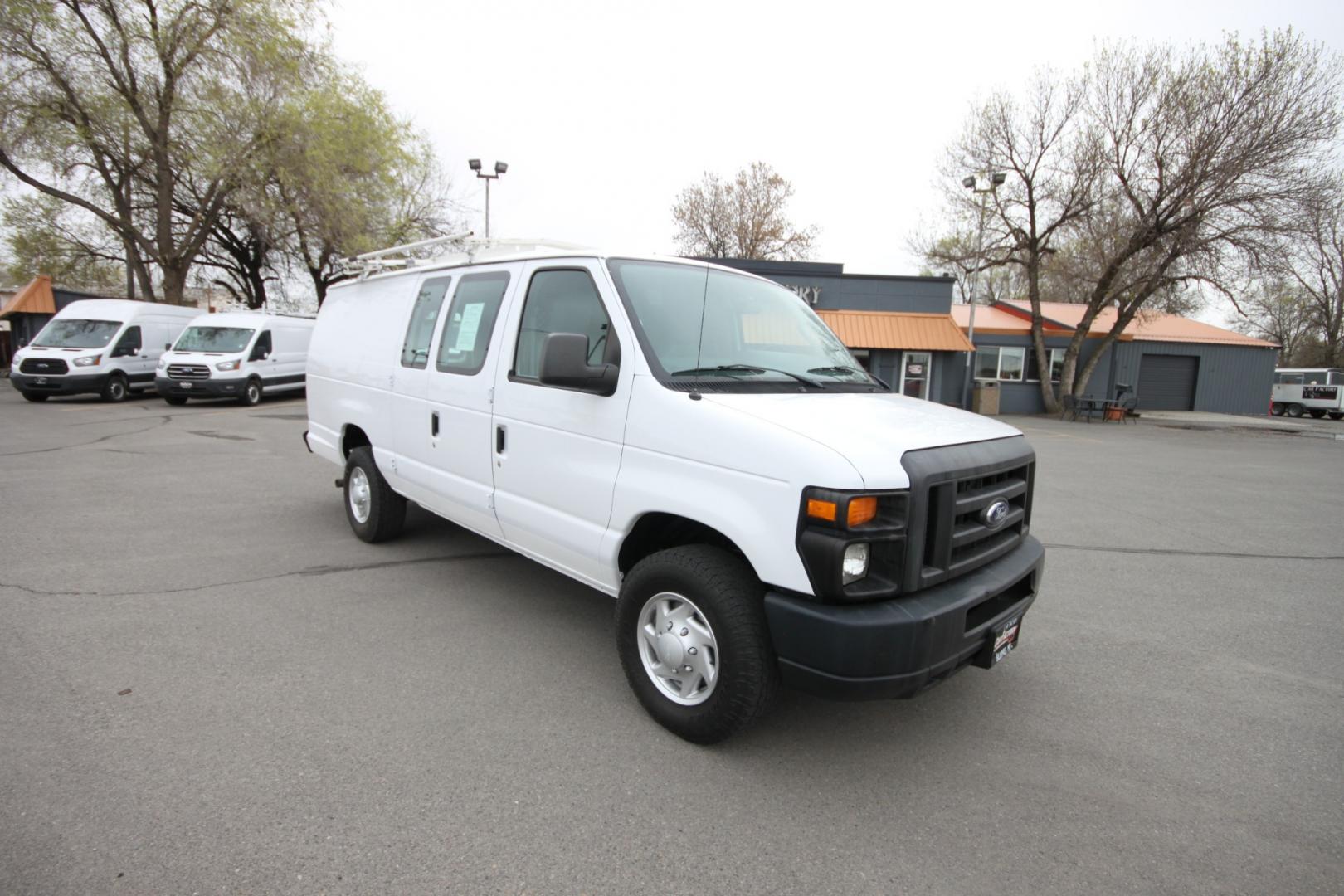 2014 White /Grey Ford E-Series Van (1FTSS3EL3ED) with an 5.4L V8 engine, Automatic transmission, located at 4562 State Avenue, Billings, MT, 59101, (406) 896-9833, 45.769516, -108.526772 - 2014 Ford E-350 Super Duty Extended Cargo Van - One owner - 62,000 miles! 5.4L V8 SOHC 16V FFV Engine - 4 speed automatic transmission - rear wheel drive - 62,752 miles - One owner - Inspected and serviced - Ready to go to work today! Air conditioning - tilt steering wheel - AM/FM audio - powe - Photo#6